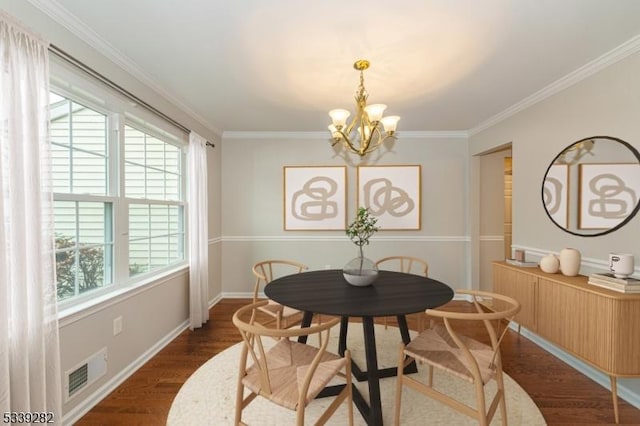 dining space featuring dark wood-type flooring, visible vents, crown molding, and an inviting chandelier