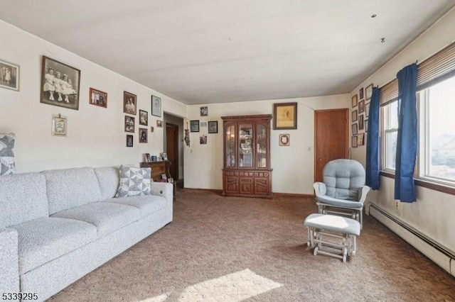 living room with carpet and baseboard heating