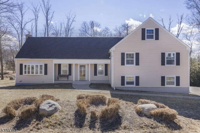 tri-level home featuring a chimney