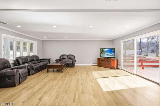 living room featuring a baseboard radiator, visible vents, light wood-style flooring, ornamental molding, and baseboards