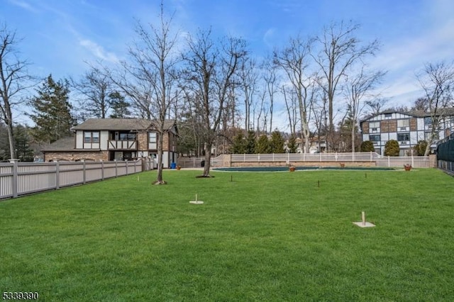 view of yard with fence