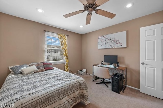 bedroom featuring light carpet, ceiling fan, baseboards, and recessed lighting