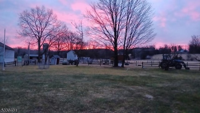 yard at dusk with fence