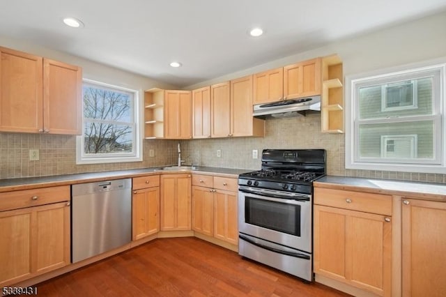 kitchen featuring open shelves, appliances with stainless steel finishes, light brown cabinetry, and under cabinet range hood