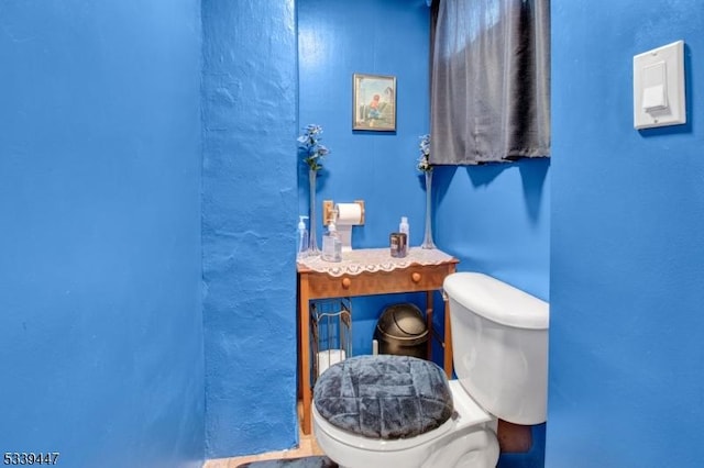 bathroom featuring toilet