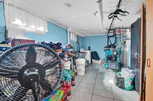 storage featuring washer / clothes dryer