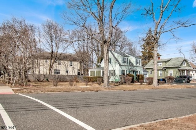 view of road with a residential view