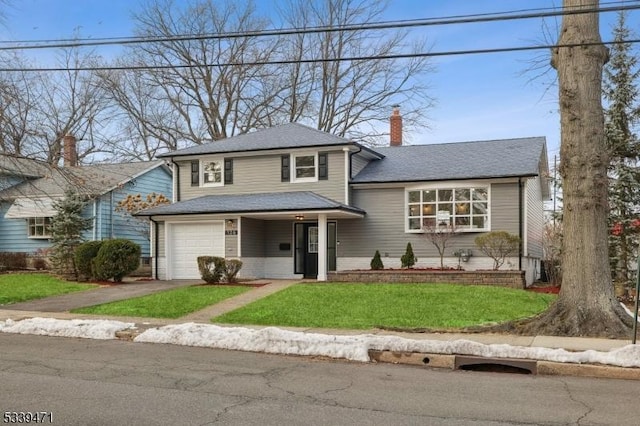 view of front facade with driveway, roof with shingles, a chimney, and a front yard