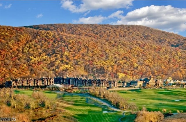 mountain view with view of golf course