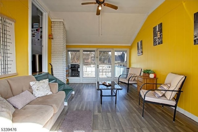 sunroom / solarium featuring lofted ceiling and ceiling fan