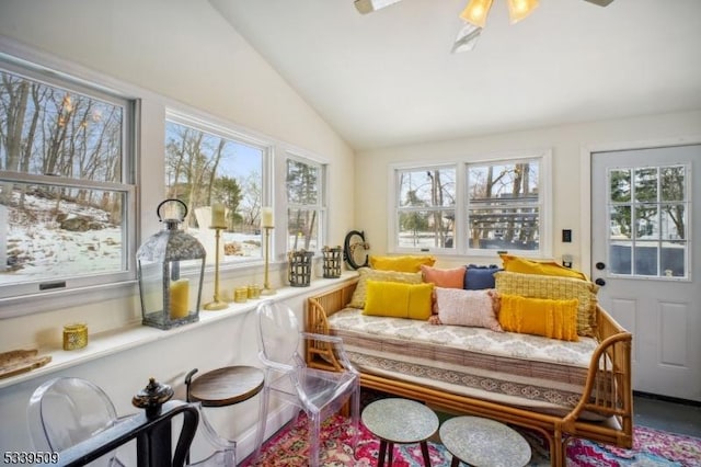 sunroom featuring vaulted ceiling