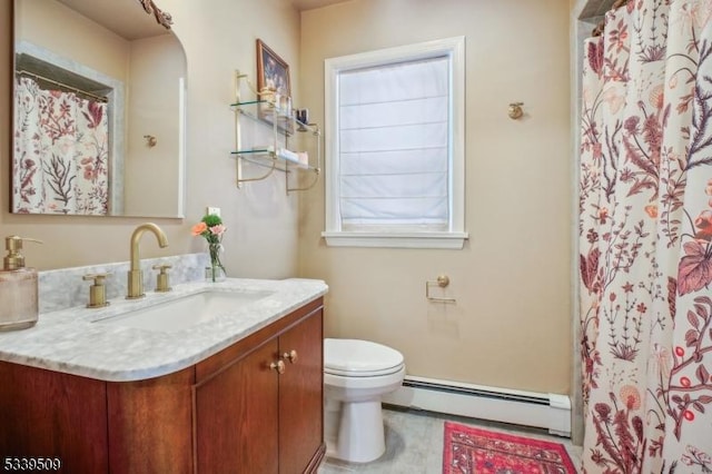 bathroom with a baseboard heating unit, curtained shower, vanity, and toilet