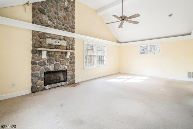 unfurnished living room featuring high vaulted ceiling, a stone fireplace, baseboards, beamed ceiling, and carpet