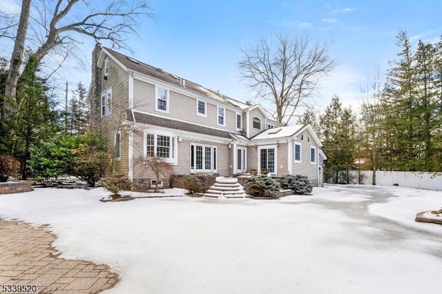 shingle-style home with entry steps