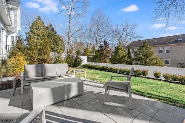 view of patio with outdoor lounge area and fence