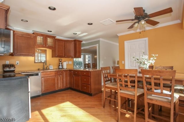 kitchen featuring brown cabinets, crown molding, glass insert cabinets, a sink, and dishwasher