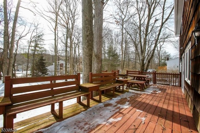 view of snow covered deck