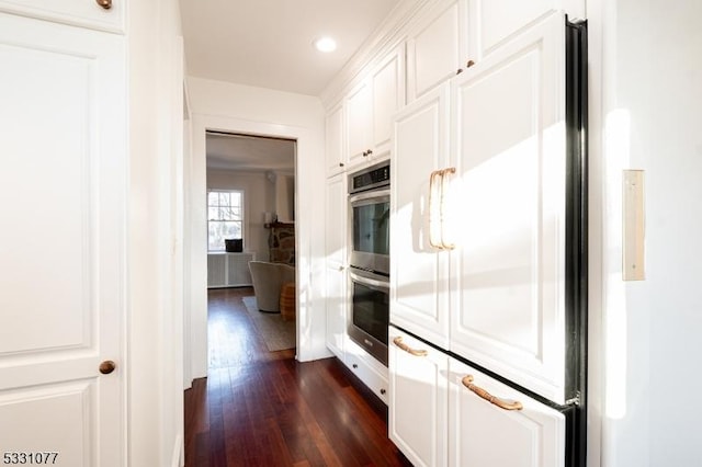 hall with dark wood-style floors