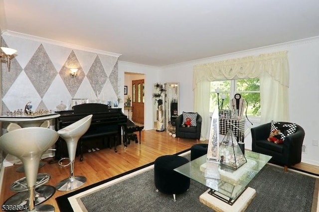 living area featuring crown molding and wood finished floors