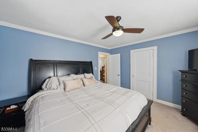 bedroom featuring ornamental molding, light carpet, baseboards, and a ceiling fan