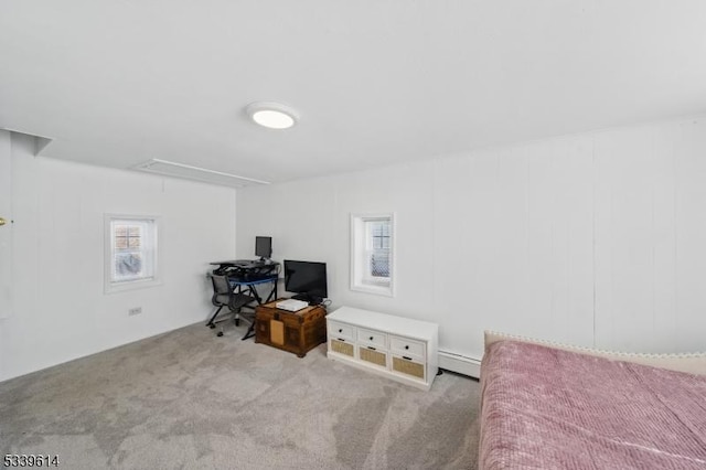 bedroom with a baseboard radiator, attic access, and light colored carpet