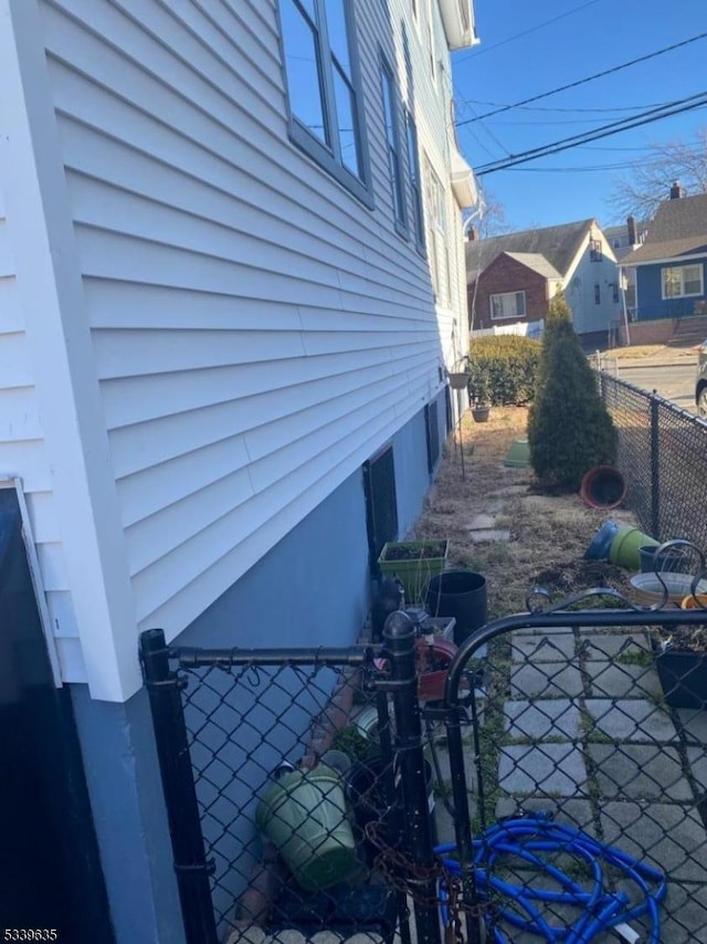 view of property exterior featuring fence