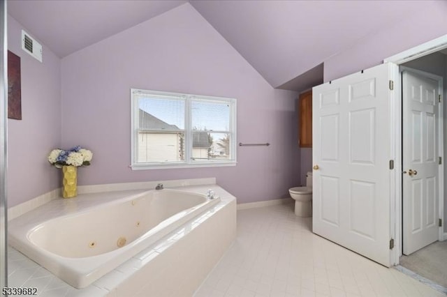 full bathroom with lofted ceiling, visible vents, toilet, a whirlpool tub, and tile patterned floors