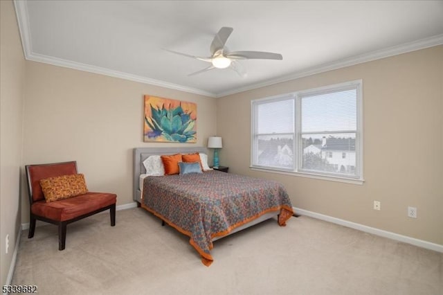 bedroom with crown molding, baseboards, a ceiling fan, and light colored carpet