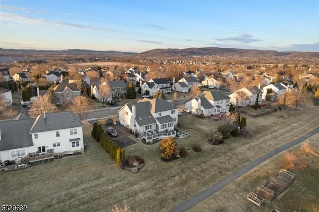 bird's eye view with a residential view and a mountain view