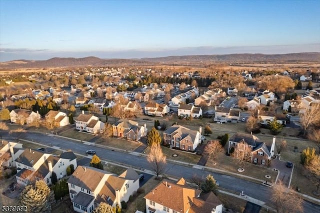 drone / aerial view featuring a mountain view and a residential view