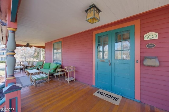 doorway to property featuring covered porch