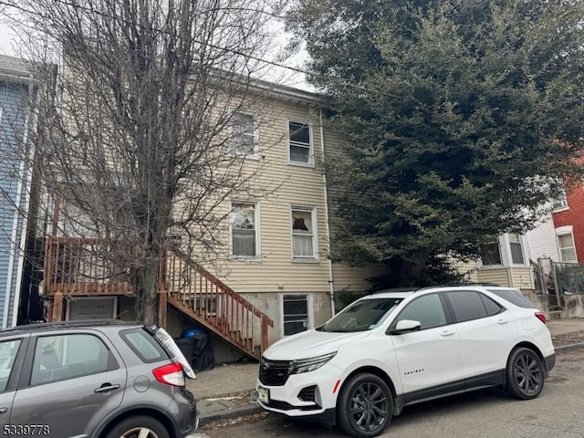 view of front of house with stairway