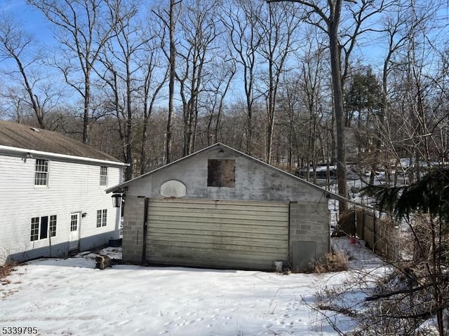 exterior space with a detached garage