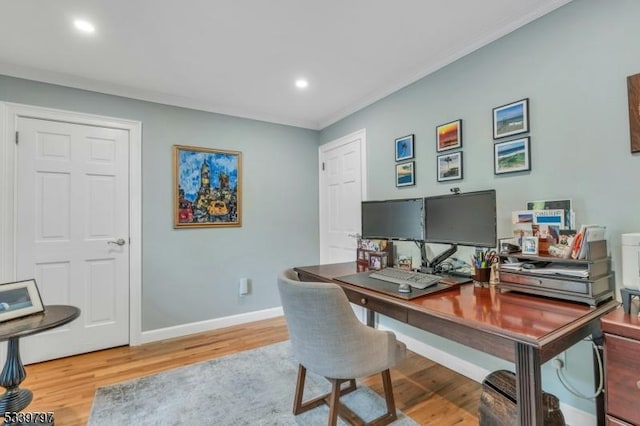 office area featuring crown molding, recessed lighting, wood finished floors, and baseboards