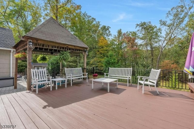 wooden deck with a gazebo