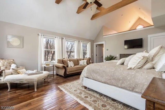 bedroom with high vaulted ceiling, hardwood / wood-style floors, beam ceiling, and a ceiling fan