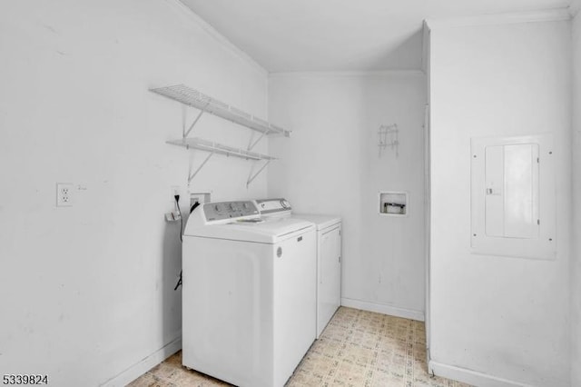 laundry area with laundry area, baseboards, electric panel, light floors, and washing machine and clothes dryer