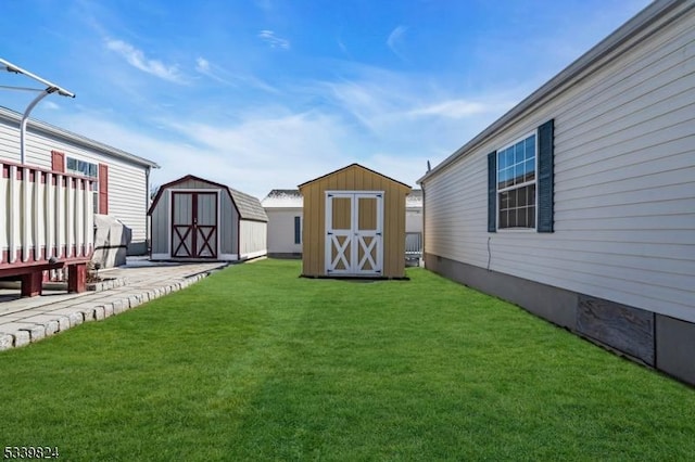 view of yard with a storage unit and an outdoor structure