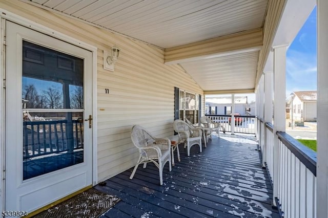 wooden deck featuring a porch