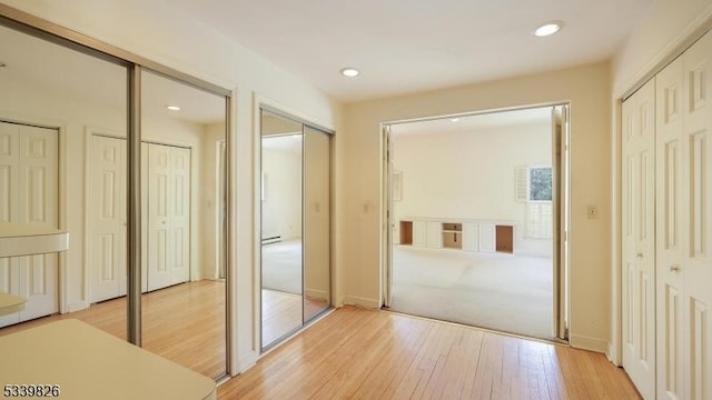 interior space featuring recessed lighting and light wood-style flooring