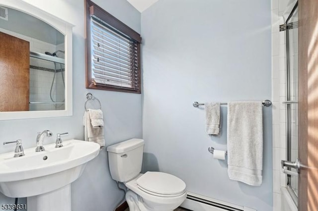 full bathroom with visible vents, a baseboard radiator, a sink, and toilet