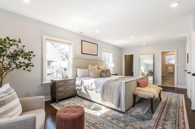 bedroom with recessed lighting, wood finished floors, and baseboards