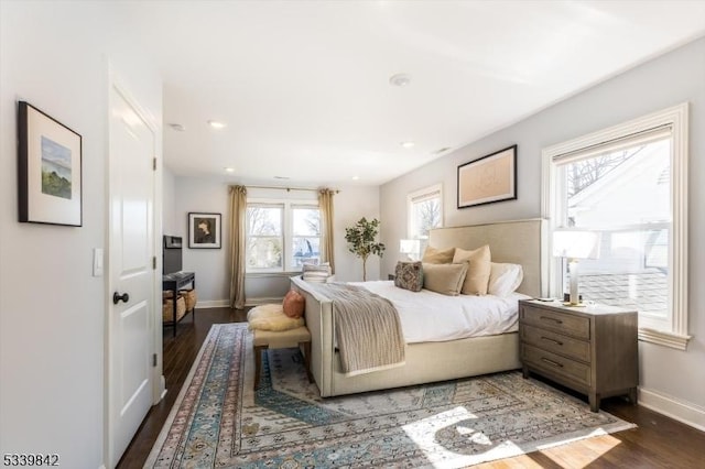 bedroom featuring recessed lighting, dark wood-type flooring, and baseboards