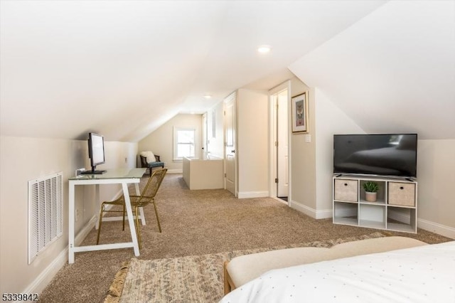 bedroom featuring lofted ceiling, carpet flooring, baseboards, and visible vents