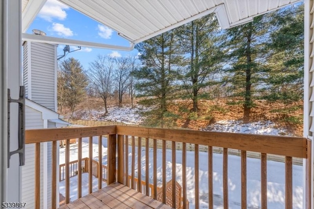 view of snow covered deck