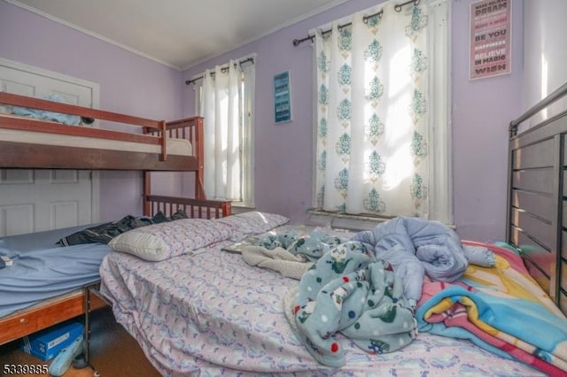 bedroom featuring ornamental molding