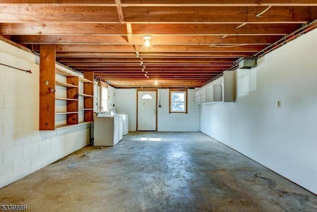 basement featuring washing machine and dryer