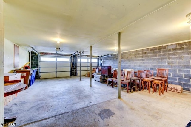 garage with concrete block wall