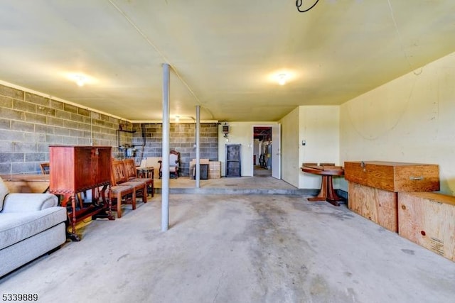 interior space featuring concrete block wall