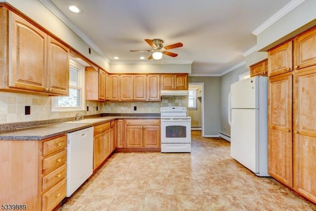 kitchen with under cabinet range hood, white appliances, a sink, decorative backsplash, and crown molding